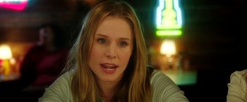 Movie still from “Bad Moms” (2016), directed by Scott Moore – A person with long blonde hair; Close Up shot, Over the shoulder angle
