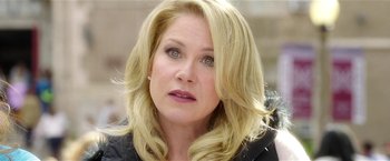 Movie still from “Bad Moms” (2016), directed by Scott Moore – A person with blonde hair; Close Up shot, Over the shoulder angle