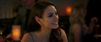 Movie still from “Bad Moms” (2016), directed by Scott Moore – A beautiful woman with long dark brown hair; Close Up shot, Over the shoulder angle