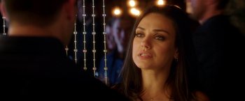 Movie still from “Bad Moms” (2016), directed by Scott Moore – A beautiful woman with long dark brown hair; Close Up shot, Over the shoulder angle