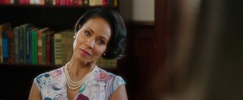 Movie still from “Bad Moms” (2016), directed by Scott Moore – A person wearing a necklace; Close Up shot, Over the shoulder angle