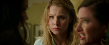 Movie still from “Bad Moms” (2016), directed by Scott Moore – A person with blonde hair; Close Up shot, Over the shoulder angle