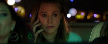 Movie still from “Bad Moms” (2016), directed by Scott Moore – A woman is talking on a cell phone; Close Up shot, Over the shoulder angle