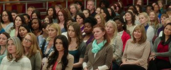 Movie still from “Bad Moms” (2016), directed by Scott Moore – A group of people sitting in front of each other in a room; Medium shot, High angle