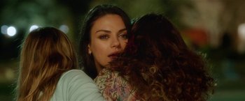 Movie still from “Bad Moms” (2016), directed by Scott Moore – Two women embracing each other in the rain; Close Up shot, Over the shoulder angle