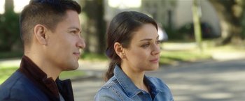 Movie still from “Bad Moms” (2016), directed by Scott Moore – A man and a woman sitting next to each other on the street; Close Up shot, Over the shoulder angle