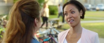 Movie still from “Bad Moms” (2016), directed by Scott Moore – Two women talking to each other in front of a bicycle; Close Up shot, Over the shoulder angle