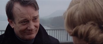 Movie still from “Bad Timing: A Sensual Obsession” (1980), directed by Nicolas Roeg – A man and a woman are looking at one another; Close Up shot, Over the shoulder angle