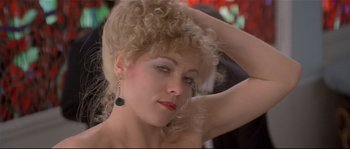 Movie still from “Bad Timing: A Sensual Obsession” (1980), directed by Nicolas Roeg – A person wearing a dress; Close Up shot, Low angle