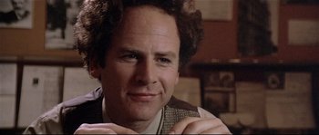 Movie still from “Bad Timing: A Sensual Obsession” (1980), directed by Nicolas Roeg – A person with curly hair; Close Up shot, Over the shoulder angle