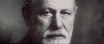 Movie still from “Bad Timing: A Sensual Obsession” (1980), directed by Nicolas Roeg – An older man with a beard and mustache; Extreme Close Up shot, High angle