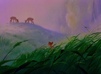 Movie still from “Bambi” (1942), directed by David Hand – A painting of three deer grazing on a grassy hill; Wide shot, Low angle