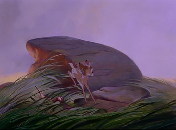 Movie still from “Bambi” (1942), directed by David Hand – A painting of an antelope standing on top of a hill; Wide shot, Low angle