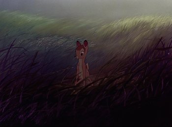 Movie still from “Bambi” (1942), directed by David Hand – An animal is standing in a field of tall grass; Wide shot, High angle
