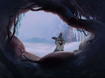 Movie still from “Bambi” (1942), directed by David Hand – A painting of an animal in a cave; Wide shot, Low angle