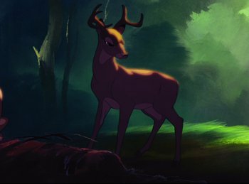 Movie still from “Bambi” (1942), directed by David Hand – A painting of an animal with horns in a dark forest; Wide shot, High angle