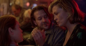 Movie still from “Barfly” (1987), directed by Barbet Schroeder – A man and a woman talking to each other in a bar; Close Up shot, Over the shoulder angle