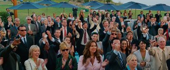 Movie still from “Step Brothers” (2008), directed by Adam McKay – A large group of people in business attire clapping; Wide shot, High angle