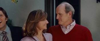 Movie still from “Step Brothers” (2008), directed by Adam McKay – An older man and a younger woman looking at one another; Close Up shot, Low angle