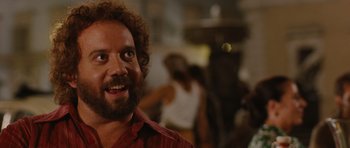 Movie still from “Barney's Version” (2010), directed by Richard J. Lewis – A person with curly hair and a beard; Close Up shot, Low angle