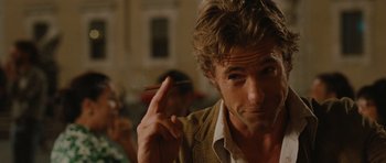 Movie still from “Barney's Version” (2010), directed by Richard J. Lewis – A person holding a cigarette; Close Up shot, Over the shoulder angle