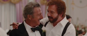 Movie still from “Barney's Version” (2010), directed by Richard J. Lewis – A couple of men standing next to each other; Close Up shot, Over the shoulder angle