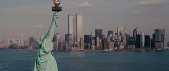 Movie still from “Barney's Version” (2010), directed by Richard J. Lewis – The statue of liberty stands in front of the twin towers; Extreme Wide shot, Low angle