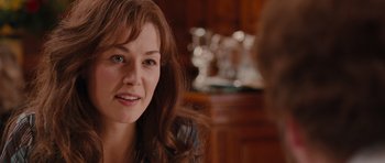 Movie still from “Barney's Version” (2010), directed by Richard J. Lewis – A person sitting at a table; Close Up shot, Over the shoulder angle