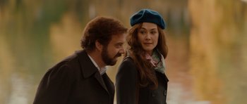 Movie still from “Barney's Version” (2010), directed by Richard J. Lewis – A man and a woman standing next to each other; Medium shot, Over the shoulder angle