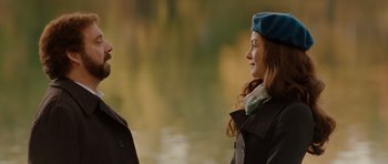 Movie still from “Barney's Version” (2010), directed by Richard J. Lewis – Two people standing next to each other near a body of water; Medium shot, Over the shoulder angle
