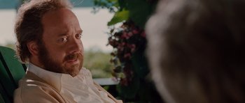 Movie still from “Barney's Version” (2010), directed by Richard J. Lewis – A person wearing a white shirt; Close Up shot, Over the shoulder angle