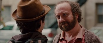 Movie still from “Barney's Version” (2010), directed by Richard J. Lewis – A man with a beard talking to another man; Close Up shot, Over the shoulder angle