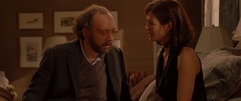 Movie still from “Barney's Version” (2010), directed by Richard J. Lewis – A man and a woman talking to each other; Medium shot, Over the shoulder angle