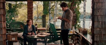 Movie still from “Barney's Version” (2010), directed by Richard J. Lewis – A man and a woman sitting at an outdoor table; Medium shot, Over the shoulder angle