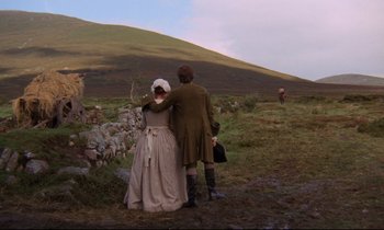 Movie still from “Barry Lyndon” (1975), directed by Stanley Kubrick – A man and a woman standing next to each other in a field; Extreme Wide shot, High angle