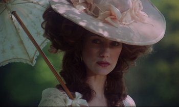 Movie still from “Barry Lyndon” (1975), directed by Stanley Kubrick – A woman in a white dress holding an umbrella; Close Up shot, Low angle