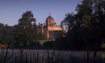 Movie still from “Barry Lyndon” (1975), directed by Stanley Kubrick – A large building with a dome on the top of it; Extreme Wide shot, Low angle