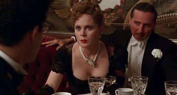Movie still from “Barton Fink” (1991), directed by Joel Coen – A woman sitting at a table in front of a man; Close Up shot, Over the shoulder angle