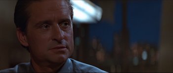 Movie still from “Basic Instinct” (1992), directed by Paul Verhoeven – A man's face as he stares into the distance; Close Up shot, Low angle