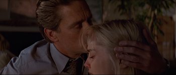 Movie still from “Basic Instinct” (1992), directed by Paul Verhoeven – A man and a woman's face; Close Up shot, Over the shoulder angle