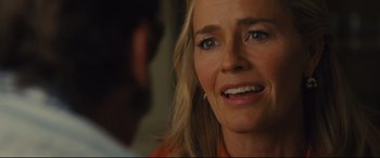 Movie still from “Battle of the Sexes” (2017), directed by Valerie Faris – A woman's face as a man looks on; Close Up shot, Over the shoulder angle