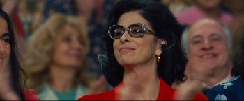 Movie still from “Battle of the Sexes” (2017), directed by Valerie Faris – A person wearing glasses and a red shirt; Close Up shot, Low angle