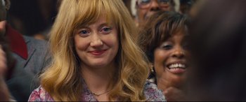 Movie still from “Battle of the Sexes” (2017), directed by Valerie Faris – A person with long blonde hair; Close Up shot, Over the shoulder angle