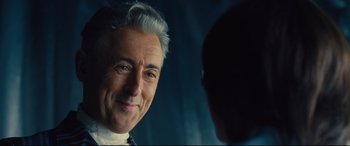 Movie still from “Battle of the Sexes” (2017), directed by Valerie Faris – An older man smiling at a younger man; Close Up shot, Over the shoulder angle