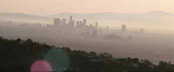 Movie still from “Battle Los Angeles” (2011), directed by Jonathan Liebesman – A view of a large city from a hill; Extreme Wide shot, High angle