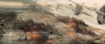 Movie still from “Battle Los Angeles” (2011), directed by Jonathan Liebesman – An aerial view of an airplane flying through the air; Extreme Wide shot, High angle