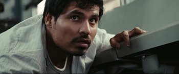 Movie still from “Battle Los Angeles” (2011), directed by Jonathan Liebesman – A person looking at the camera; Close Up shot, High angle
