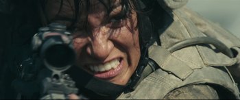 Movie still from “Battle Los Angeles” (2011), directed by Jonathan Liebesman – A person with a helmet on; Extreme Close Up shot, Low angle