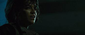 Movie still from “Battle Los Angeles” (2011), directed by Jonathan Liebesman – A person's face in the dark; Close Up shot, Low angle