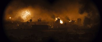 Movie still from “Battle Los Angeles” (2011), directed by Jonathan Liebesman – A large fire is burning in the sky; Extreme Wide shot, High angle